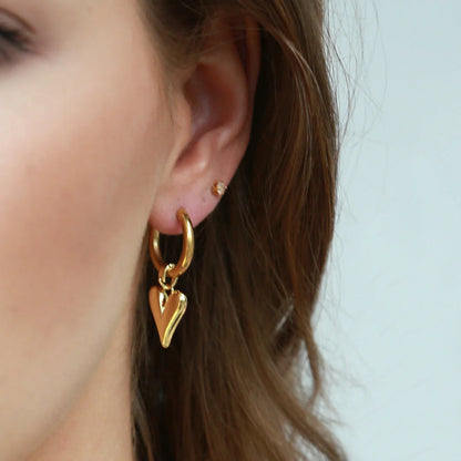 Gouden oorbellen hartjes